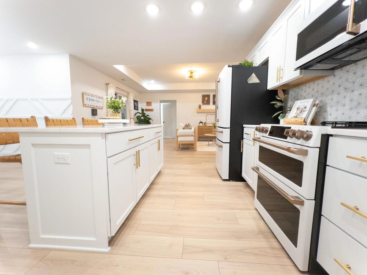 Kitchen island and cooking area opening into the adjoining living space