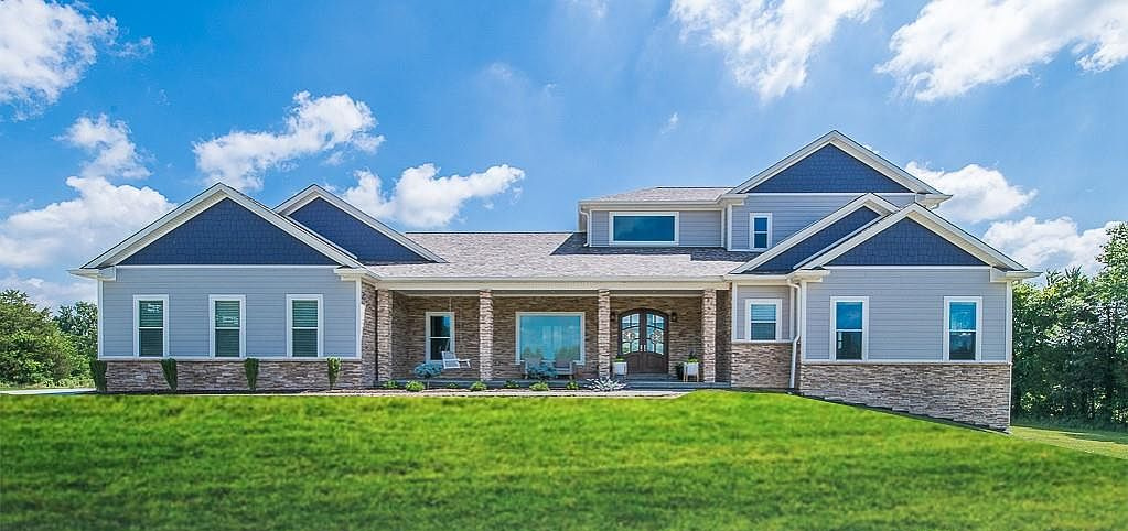 Blue-gray home with a stone-front porch at 2238 Hansberry Road